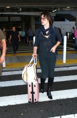 MILLA JOVOVICH at Los Angeles international Airport 10/02/2016
