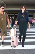 MILLA JOVOVICH at Los Angeles international Airport 10/02/2016