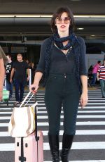 MILLA JOVOVICH at Los Angeles international Airport 10/02/2016