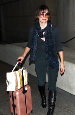 MILLA JOVOVICH at Los Angeles international Airport 10/02/2016