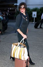MILLA JOVOVICH at Los Angeles international Airport 10/02/2016