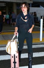 MILLA JOVOVICH at Los Angeles international Airport 10/02/2016