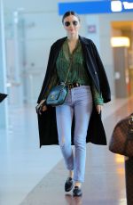 MIRANDA KERR at CDG Airport in Paris 10/04/2016
