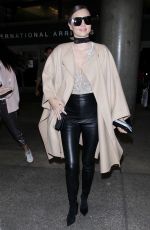 MIRANDA KERR at Los Angeles International Airport in Los Angeles 10/05/2016