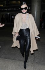 MIRANDA KERR at Los Angeles International Airport in Los Angeles 10/05/2016