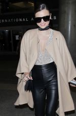MIRANDA KERR at Los Angeles International Airport in Los Angeles 10/05/2016
