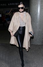 MIRANDA KERR at Los Angeles International Airport in Los Angeles 10/05/2016