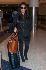 OLIVIA MUNN at LAX Airport in Los Angeles 10/03/2016