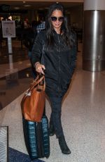 OLIVIA MUNN at LAX Airport in Los Angeles 10/03/2016