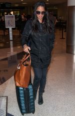 OLIVIA MUNN at LAX Airport in Los Angeles 10/03/2016