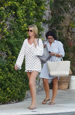 PENNY LANCASTER in Bikini at a Pool in Italy 09/19/2016