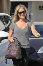 REBECCA ROMIJN Leaves a Salon in Beverly Hills 10/18/2016