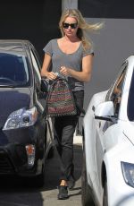 REBECCA ROMIJN Leaves a Salon in Beverly Hills 10/18/2016