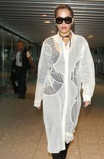 RITA ORA at Heathrow Airport in London 10/07/2016