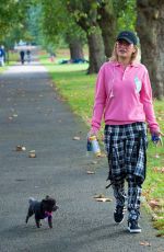 RITA ORA Walks Her Dog at a Park in London 10/01/2016