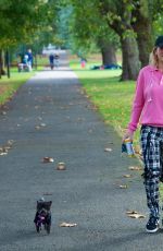 RITA ORA Walks Her Dog at a Park in London 10/01/2016