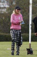 RITA ORA Walks Her Dog at a Park in London 10/01/2016