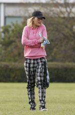 RITA ORA Walks Her Dog at a Park in London 10/01/2016