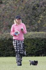 RITA ORA Walks Her Dog at a Park in London 10/01/2016