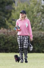 RITA ORA Walks Her Dog at a Park in London 10/01/2016
