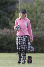 RITA ORA Walks Her Dog at a Park in London 10/01/2016