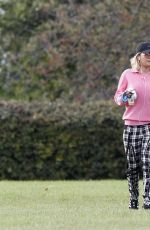 RITA ORA Walks Her Dog at a Park in London 10/01/2016