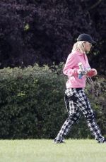 RITA ORA Walks Her Dog at a Park in London 10/01/2016