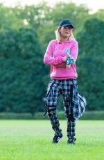RITA ORA Walks Her Dog at a Park in London 10/01/2016
