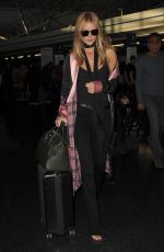ROSIE HUNTINGTON-WHITELEY at JFK Airport in New York 10/17/2016