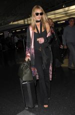 ROSIE HUNTINGTON-WHITELEY at JFK Airport in New York 10/17/2016