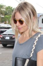 SIENNA MILLER at LAX Airport in Los Angeles 10/27/2016
