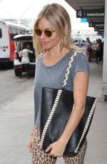 SIENNA MILLER at LAX Airport in Los Angeles 10/27/2016