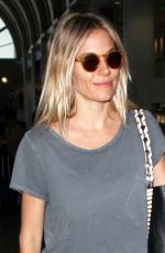 SIENNA MILLER at LAX Airport in Los Angeles 10/27/2016