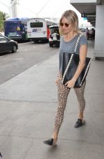 SIENNA MILLER at LAX Airport in Los Angeles 10/27/2016