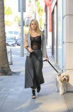 ALICE EVE Walking Her Dog Out in Beverly Hills 11/16/2016