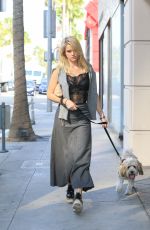 ALICE EVE Walking Her Dog Out in Beverly Hills 11/16/2016