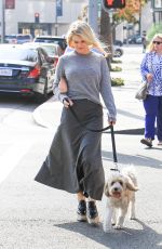 ALICE EVE Walking Her Dog Out in Beverly Hills 11/16/2016
