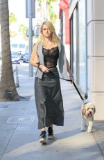 ALICE EVE Walking Her Dog Out in Beverly Hills 11/16/2016