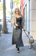 ALICE EVE Walking Her Dog Out in Beverly Hills 11/16/2016