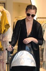 CHRISSY TEIGEN Out Shopping in West Hollywood 11/09/2016