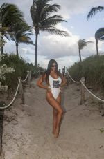 CLAUDIA ROMANI in Swimsuit at a Beach in Miami 11/05/2016