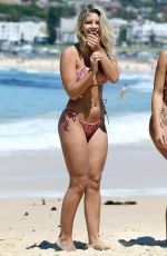 DEVIN BRUGMAN and NATASHA OAKLEY in Bikinis at a Photoshoot at Bondi Beach in Sydney 11/16/2016