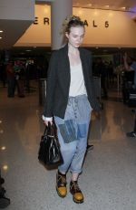 ELLE FANNING at Los Angeles International Airport 11/04/2016