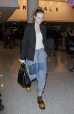 ELLE FANNING at Los Angeles International Airport 11/04/2016
