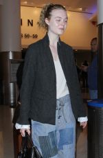 ELLE FANNING at Los Angeles International Airport 11/04/2016