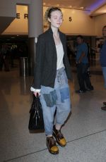 ELLE FANNING at Los Angeles International Airport 11/04/2016