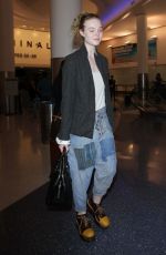 ELLE FANNING at Los Angeles International Airport 11/04/2016