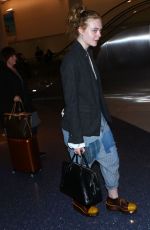 ELLE FANNING at Los Angeles International Airport 11/04/2016