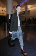 ELLE FANNING at Los Angeles International Airport 11/04/2016