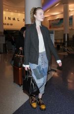 ELLE FANNING at Los Angeles International Airport 11/04/2016